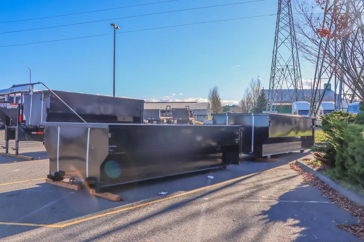 Roll-off dumpster ready for waste disposal at job site for 12 Yard Dumpster Rental in La Joya